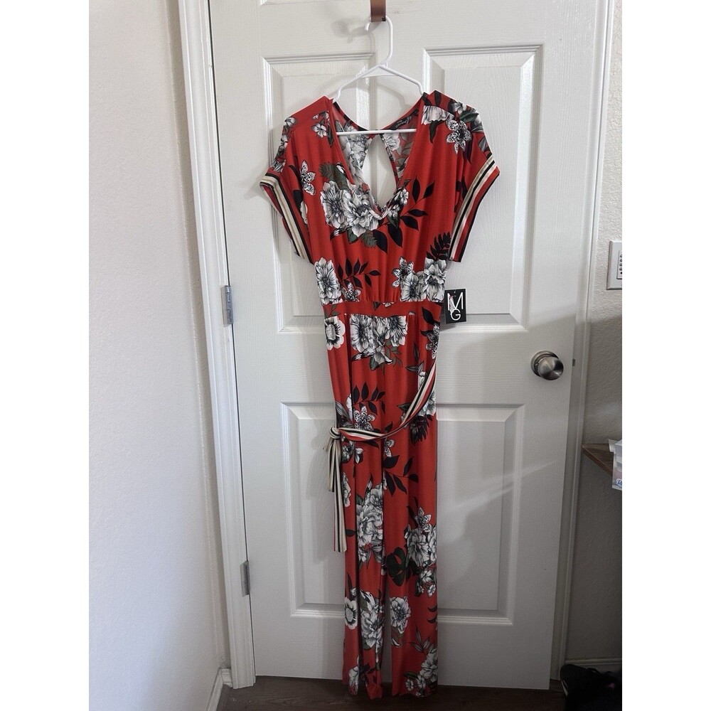 Tropical Floral Summer Weight Jumpsuit, NWT. Fun And flirty. Resort Wear